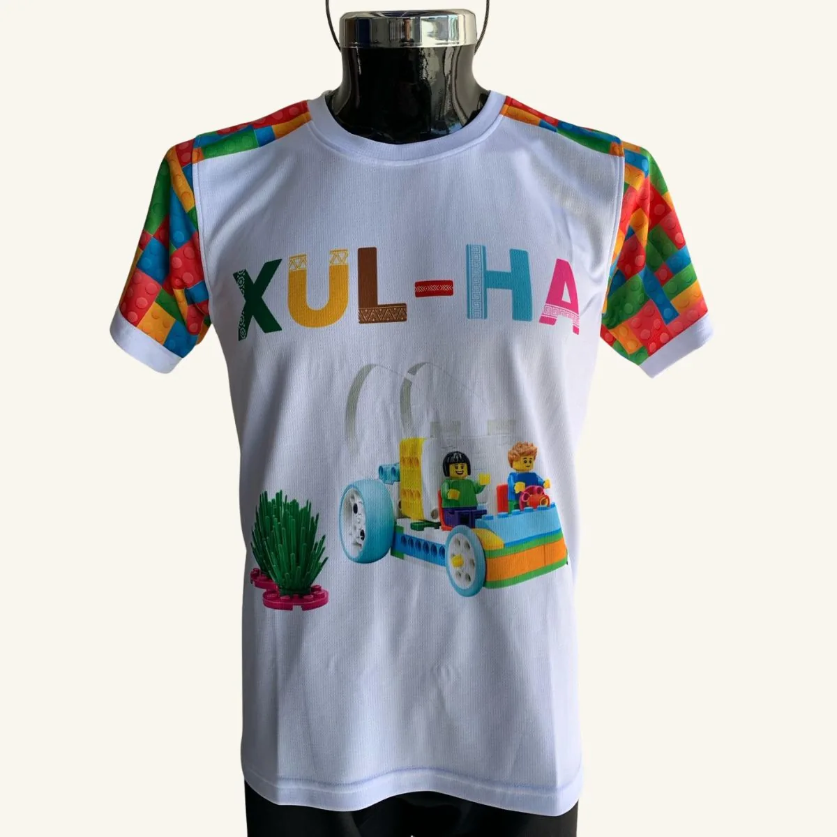 Playera personalizada para academia Xul-Ha con temática de robótica Lego